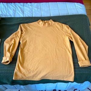 Yellow turtleneck